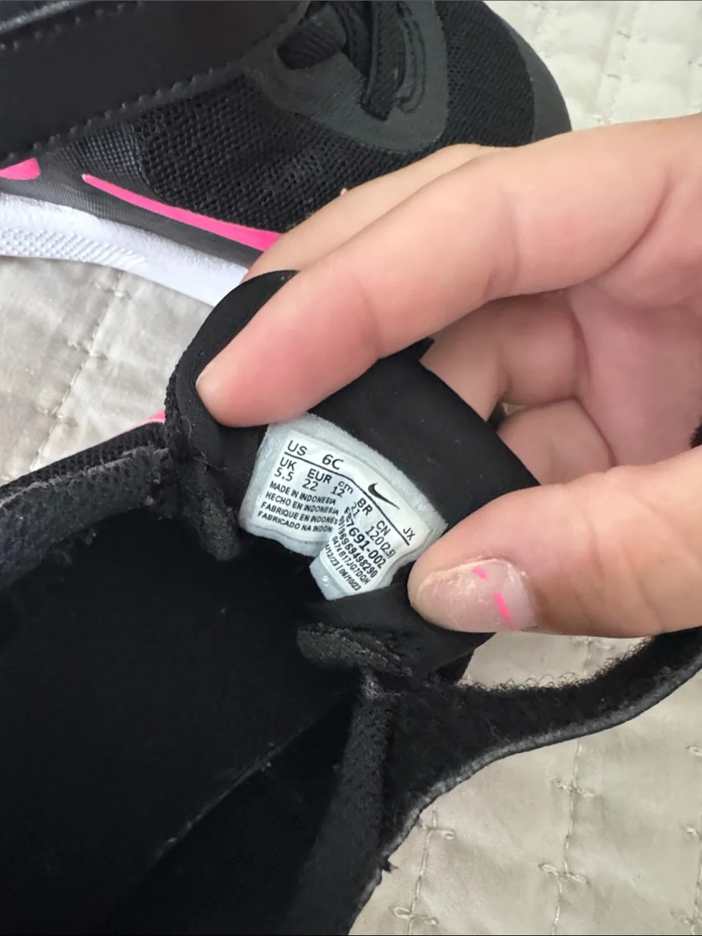 Nike Kids Black Sneakers with Pink Swoosh